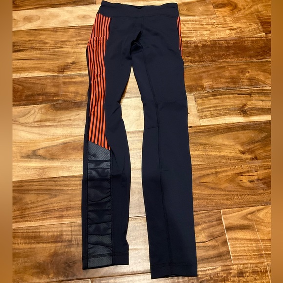 lululemon athletica Black and Orange Leggings - Picture 1 of 3